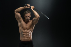 stock-photo-54086014-mature-man-in-action-with-sword